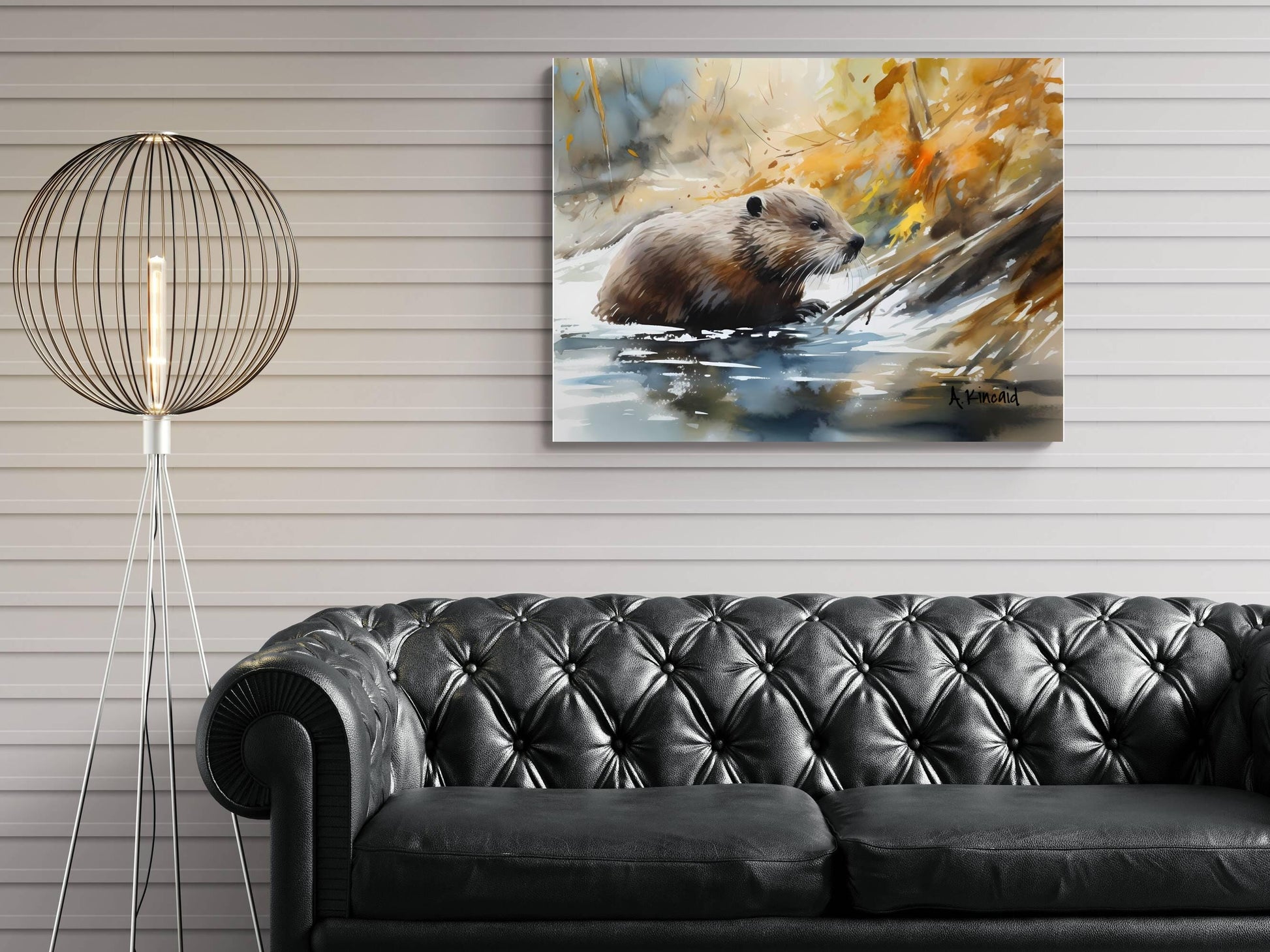 a black leather couch in a living room setting, with a painting of a beaver in the background hanging on the wall above it.