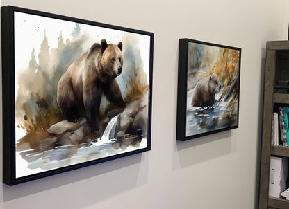 two framed paintings of bears, one larger and one smaller, hanging on a wall.