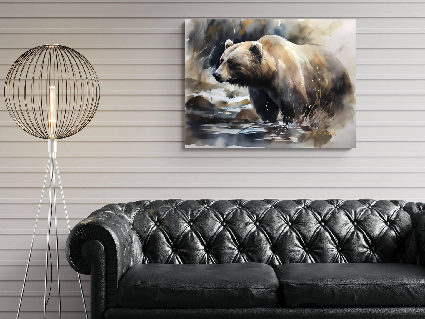 a large painting of a bear on the wall, with a black leather couch in the foreground.