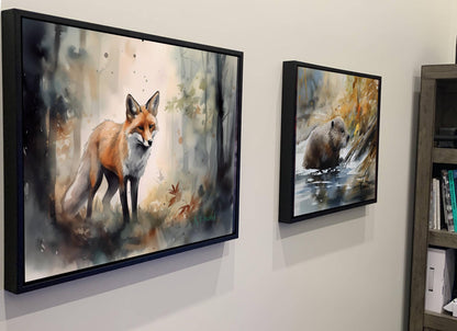 two framed paintings of animals, one of a fox and the other of a bear, hanging on a wall.