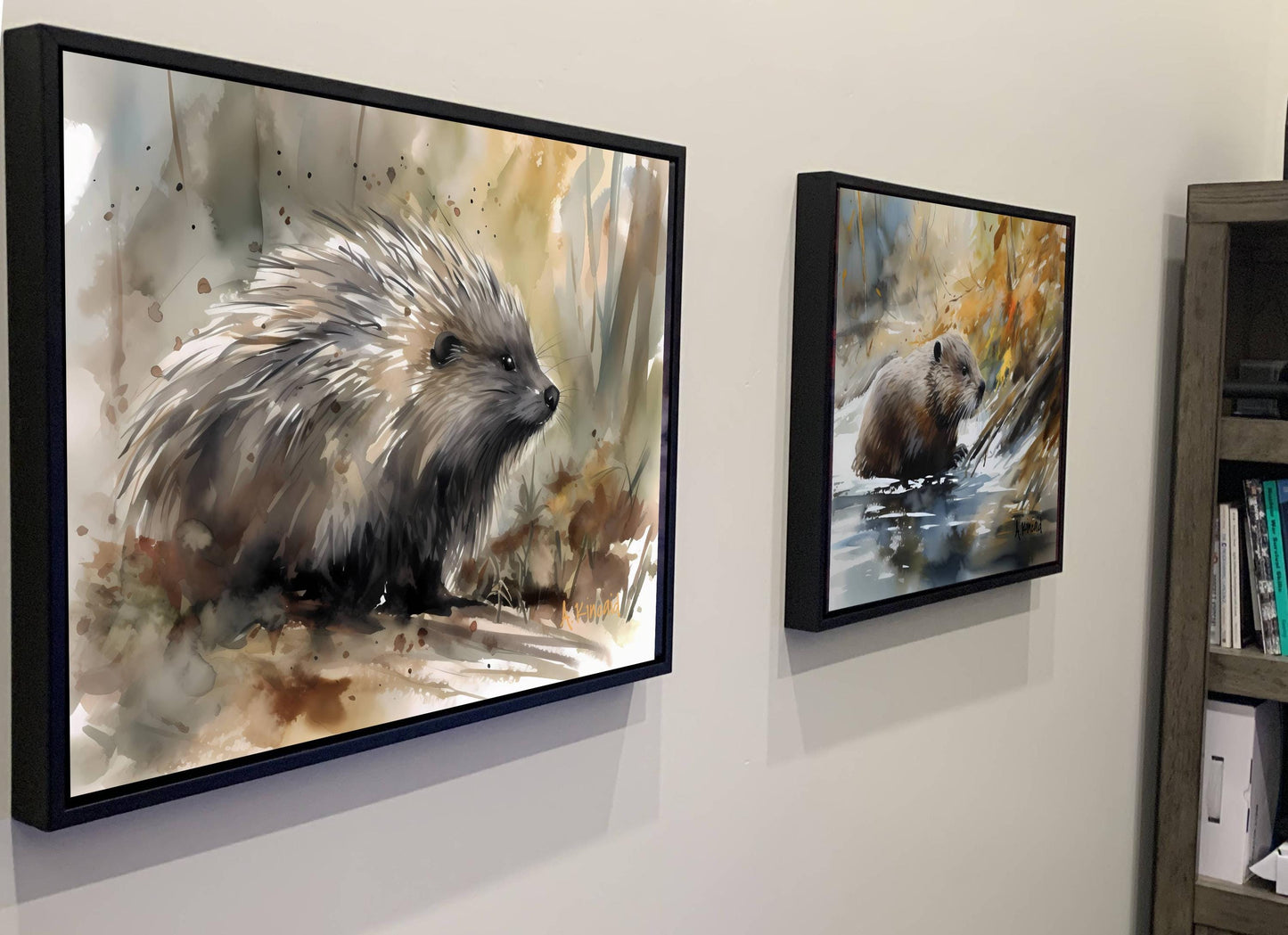 two framed paintings of porcupines on a wall.