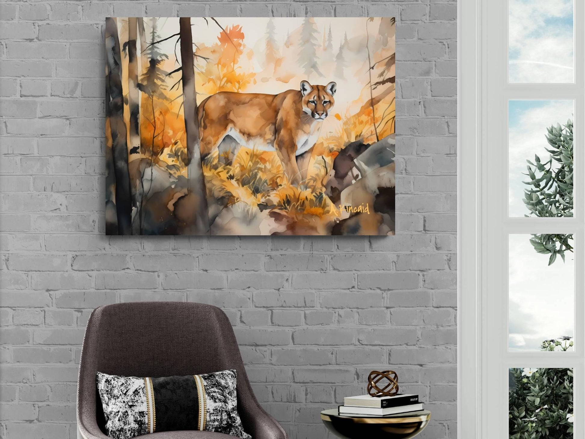 a painting of a cougar in a forest setting, hanging on a brick wall.