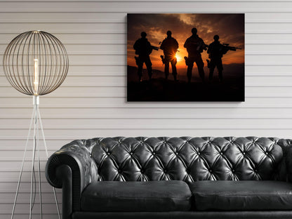 a black leather couch in a living room, with a large framed picture of four silhouetted soldiers in the background, depicting a dramatic sunset.