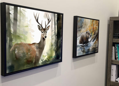 two framed paintings hanging on a wall, depicting a deer and a bear in a forest setting.