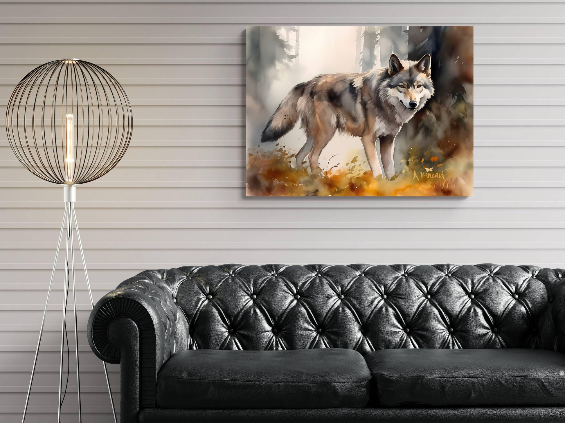 a large painting of a wolf on the wall, with a black leather couch in the foreground.